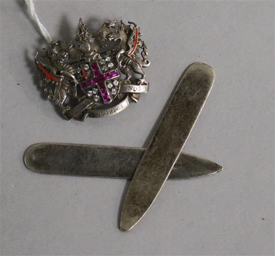Two modern silver collar stiffeners and a silver and gem set brooch with crest.